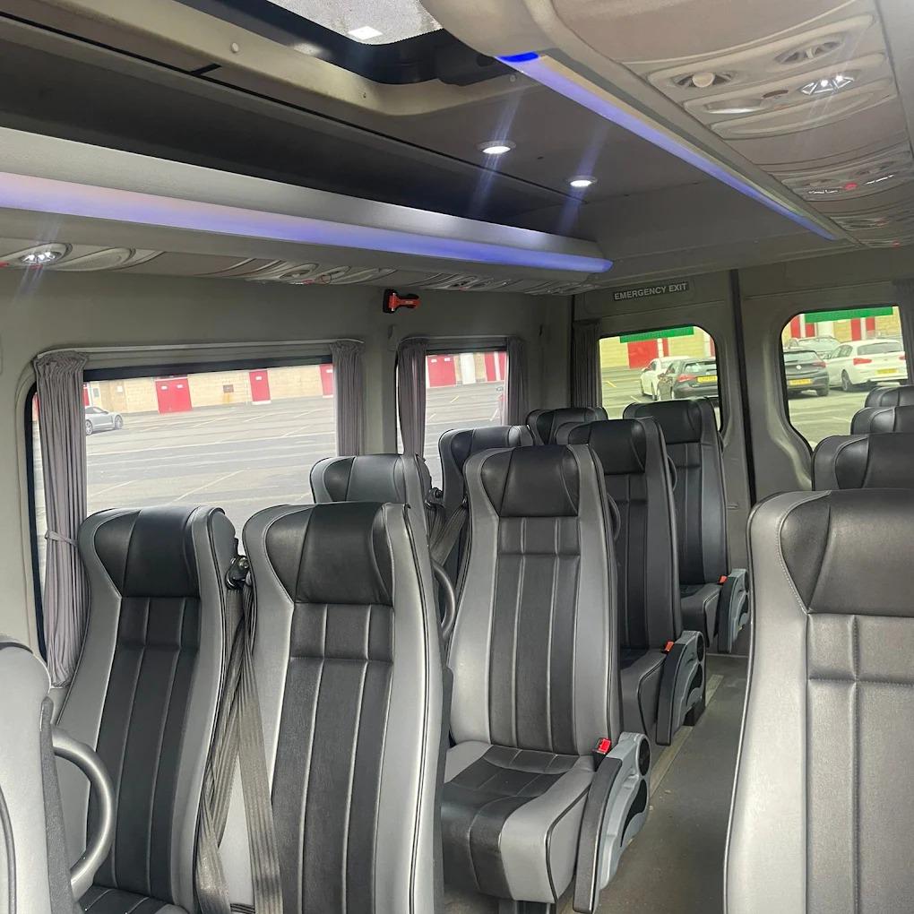 Premium black leather interior with mood lighting inside a Compare Minibus Travel minibus